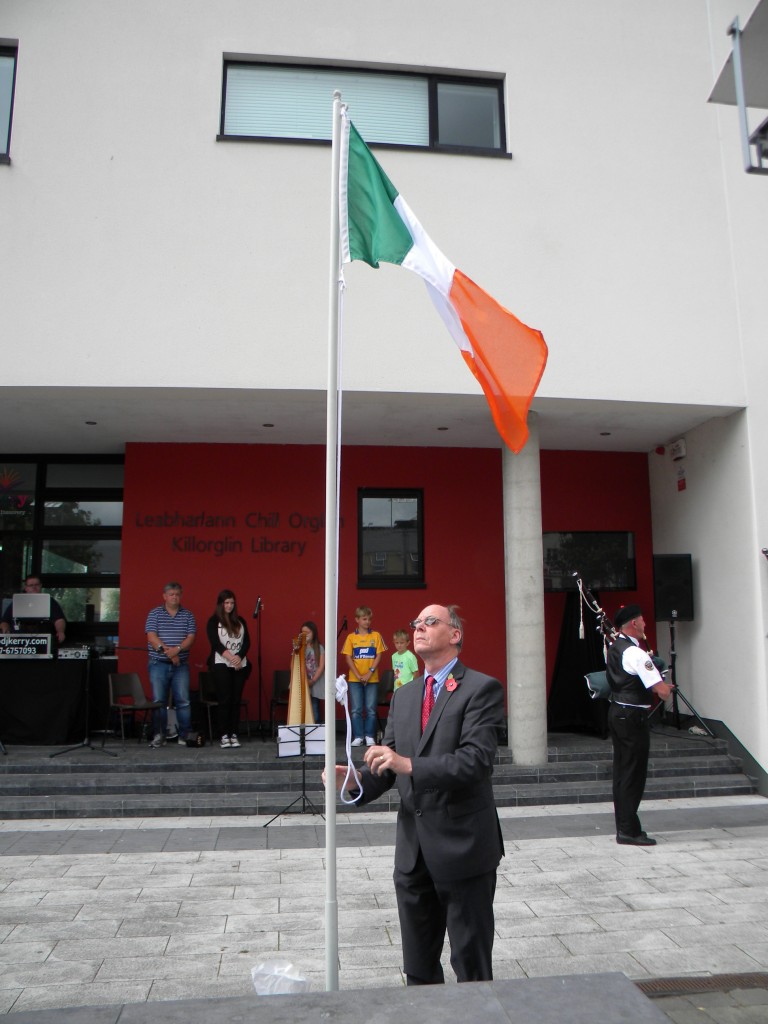 Stephen Thompson raising the National Flag