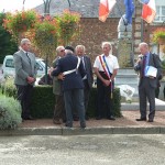 Mr. Ollie Griffin, President of The RMFA presenting RMFA shields to the Chalandre and Logez families.