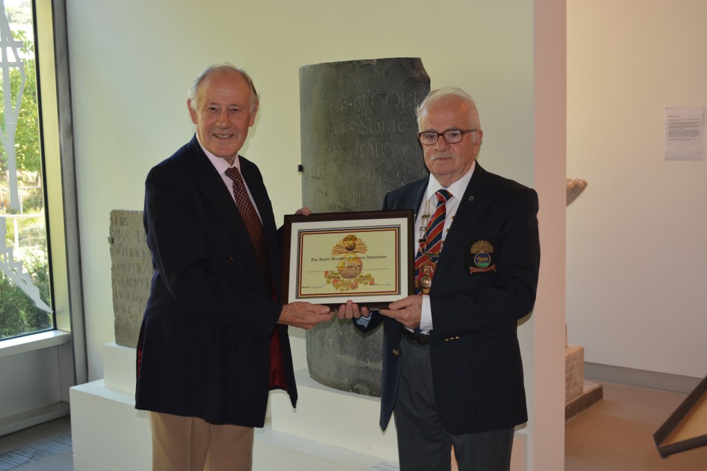 Col. Dudding receiving Honorary Life Membership of the RMFA from association President, Ollie Griffin.